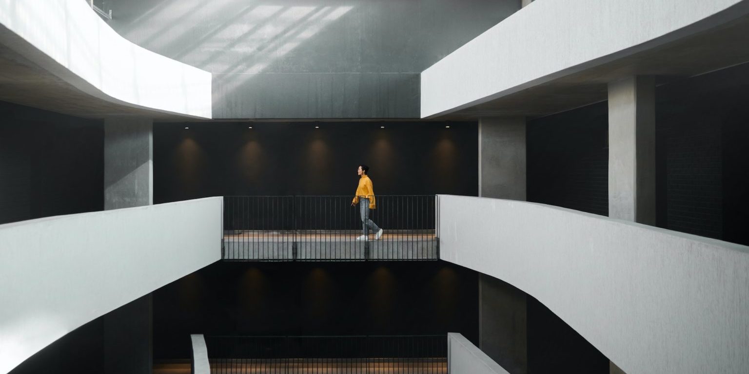 architecture-lighting-and-walking-woman-in-a-building-for-work-entrepreneurship-and-start-of-job–1536×972